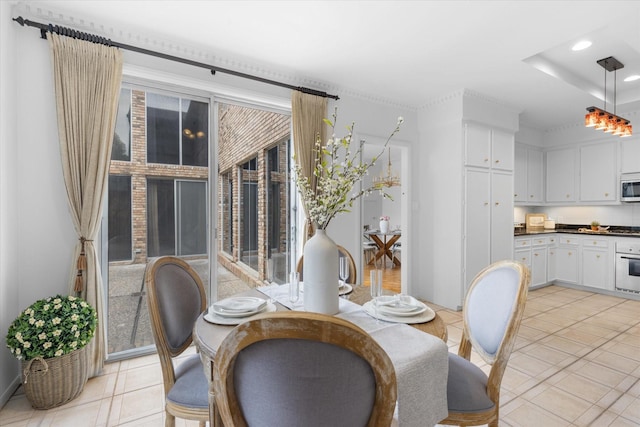 dining space with recessed lighting and light tile patterned floors