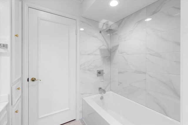 bathroom featuring shower / bathing tub combination and recessed lighting