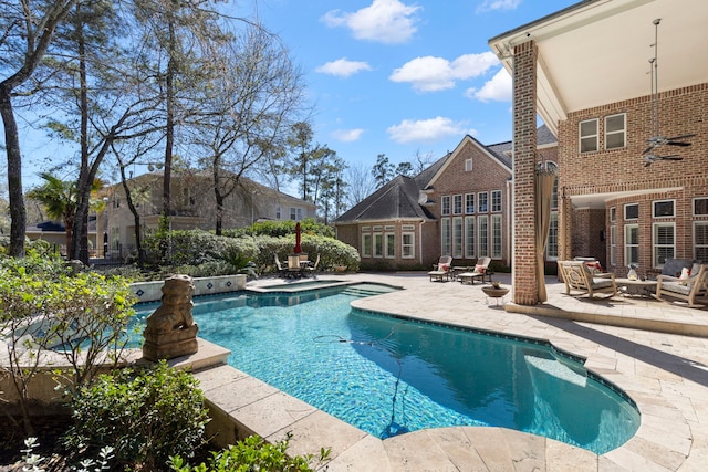 outdoor pool with a patio