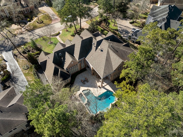 birds eye view of property with a residential view