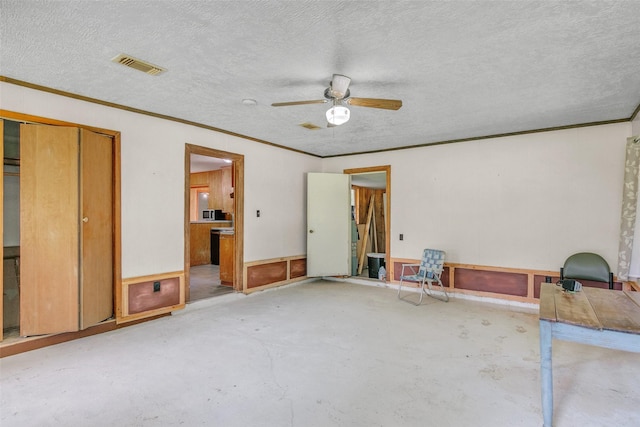 unfurnished bedroom featuring concrete flooring, visible vents, ornamental molding, and a textured ceiling