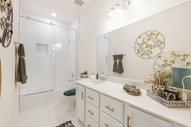 full bathroom with bath / shower combo with glass door, visible vents, toilet, vanity, and tile patterned flooring