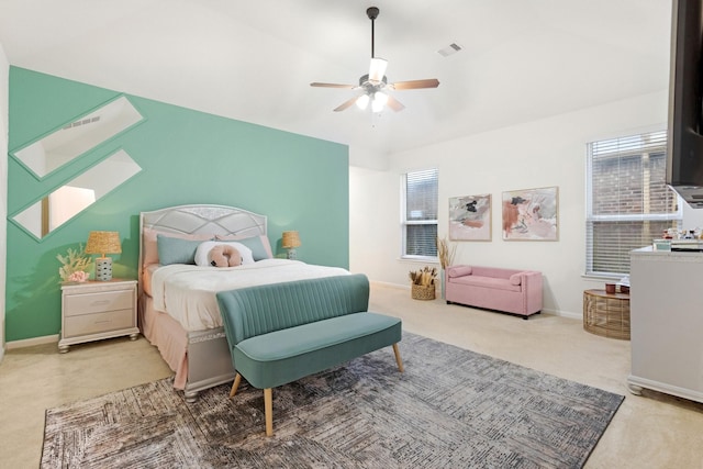 bedroom featuring carpet floors, visible vents, baseboards, and a ceiling fan