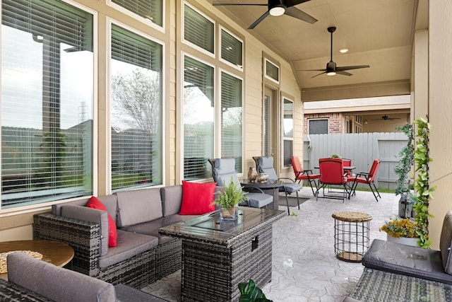 view of patio / terrace featuring a ceiling fan, outdoor dining space, outdoor lounge area, and fence