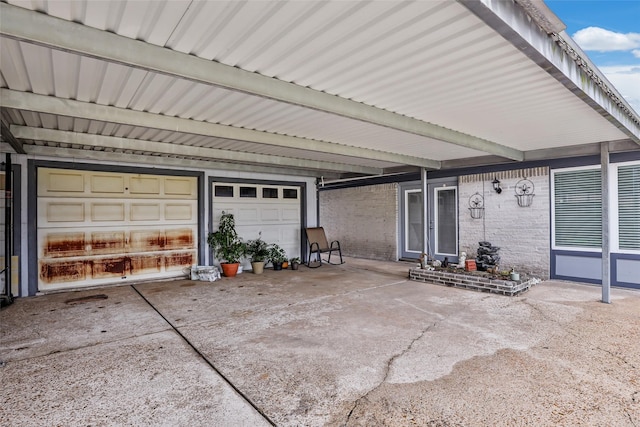 5826 Russell Ln, Baytown, TX 77521 - garage featuring concrete driveway