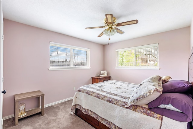 5826 Russell Ln, Baytown, TX 77521 - bedroom featuring carpet, ceiling fan, and baseboards