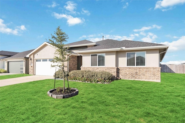 view of front of house with a garage, a front yard, fence, and stucco siding