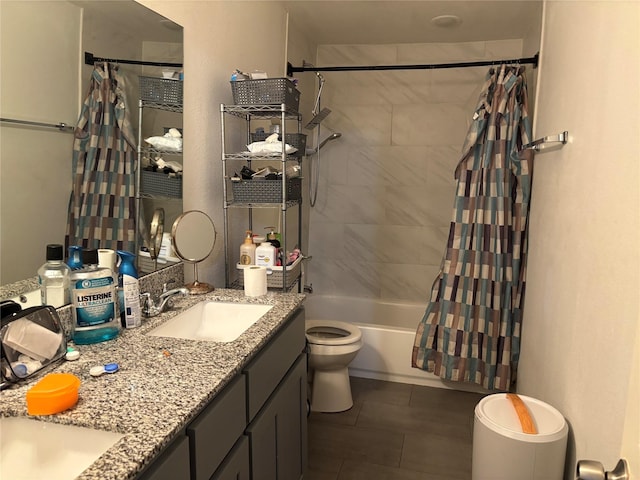 bathroom featuring vanity, toilet, and shower / bath combo