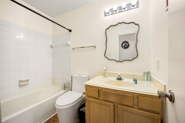 bathroom featuring toilet, bathtub / shower combination, and vanity