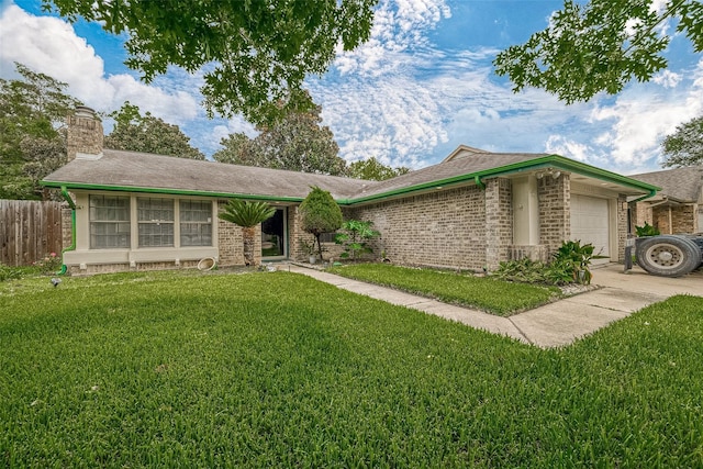 single story home with an attached garage, brick siding, a chimney, and a front yard