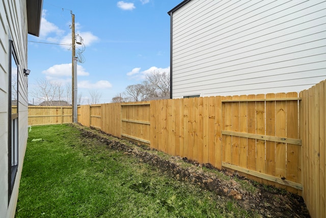 view of yard featuring a fenced backyard