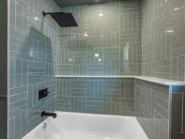 bathroom with bathing tub / shower combination