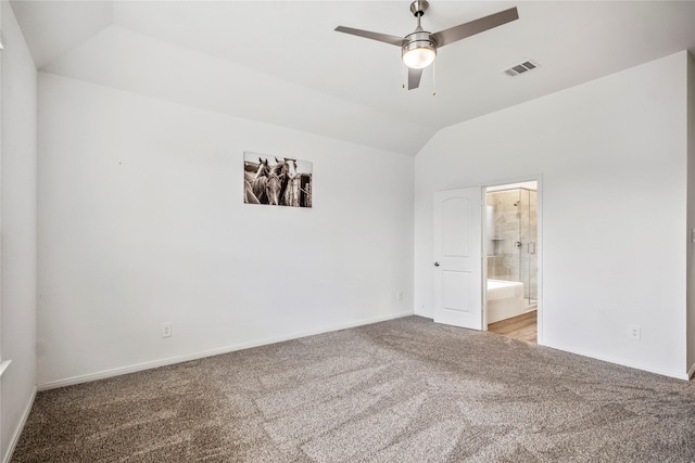 unfurnished room with lofted ceiling, light carpet, visible vents, baseboards, and a ceiling fan