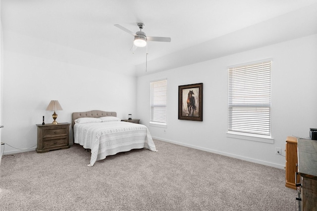 bedroom featuring carpet floors, baseboards, and a ceiling fan