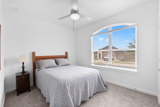 bedroom featuring carpet, ceiling fan, and baseboards