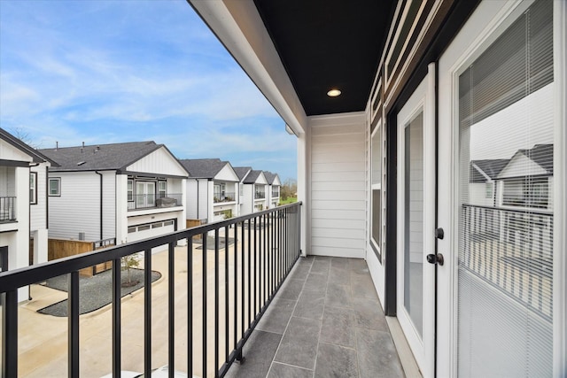 balcony featuring a residential view