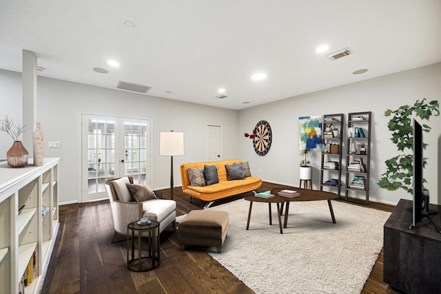 living room featuring french doors, dark wood-style flooring, visible vents, and recessed lighting