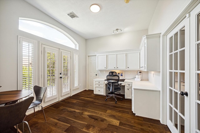 office area with french doors, dark wood-style flooring, built in study area, and visible vents