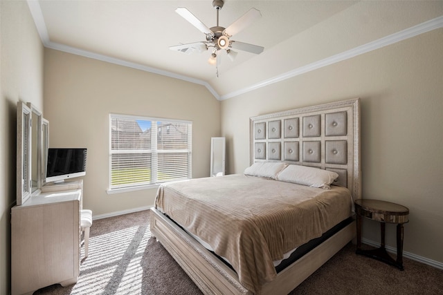 bedroom with a ceiling fan, baseboards, vaulted ceiling, dark carpet, and crown molding