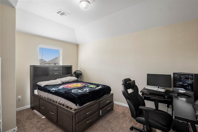 carpeted bedroom featuring visible vents, vaulted ceiling, and baseboards