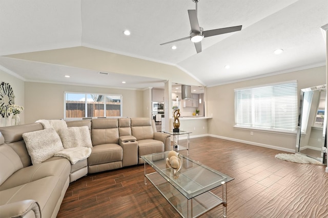 living area with dark wood-style floors, plenty of natural light, ornamental molding, and vaulted ceiling