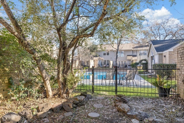 view of pool with fence and a fenced in pool