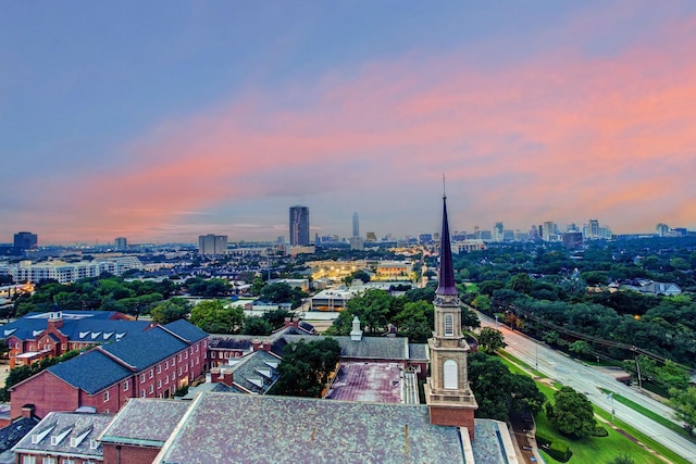 aerial view at dusk with a city view