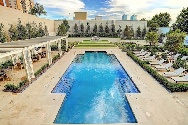 view of pool featuring a patio area