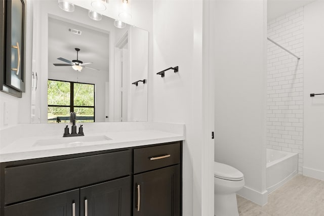 full bath featuring shower / bath combination, visible vents, toilet, ceiling fan, and vanity