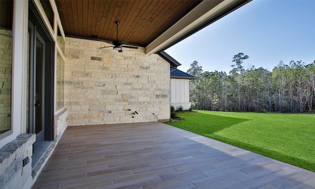 view of patio / terrace featuring ceiling fan