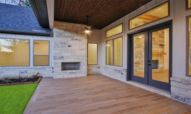 view of patio / terrace with an outdoor stone fireplace