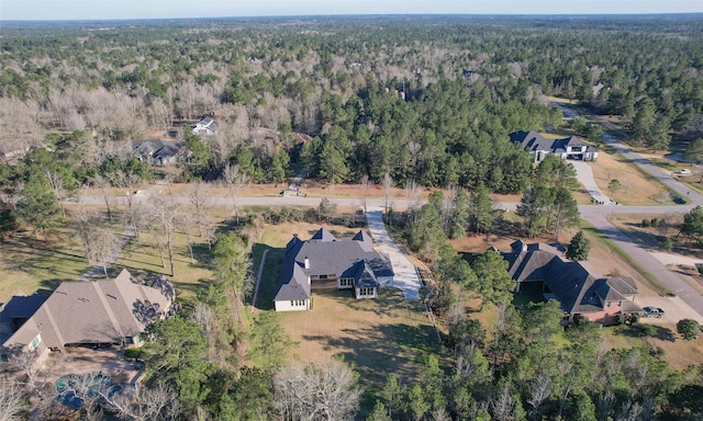 drone / aerial view with a forest view