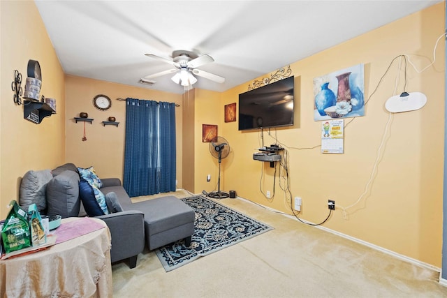 carpeted living room with a ceiling fan and visible vents