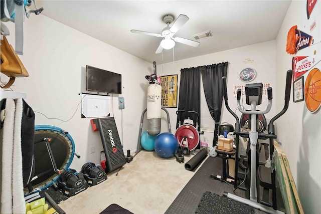 workout area with ceiling fan and visible vents