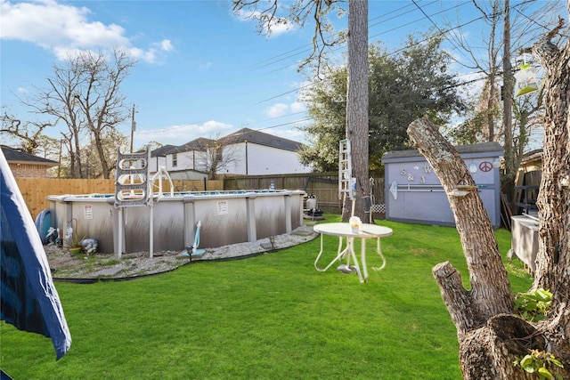 view of yard with a fenced backyard and a fenced in pool