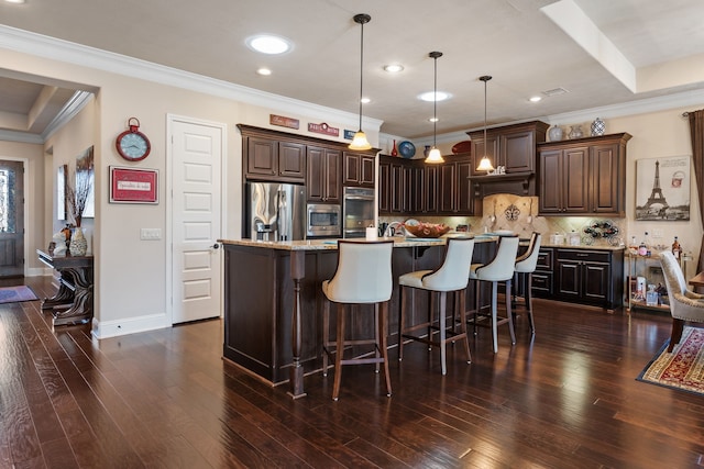 kitchen with tasteful backsplash, dark wood finished floors, appliances with stainless steel finishes, crown molding, and dark brown cabinets