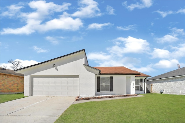 view of front facade featuring concrete driveway, brick siding, an attached garage, and a front lawn