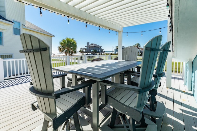 wooden deck featuring a pergola