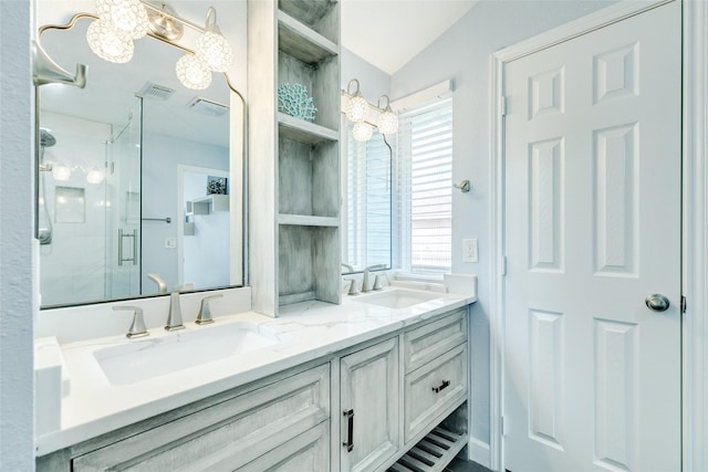 full bathroom featuring visible vents, a sink, a shower stall, and double vanity