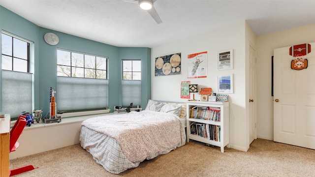 bedroom featuring carpet floors and a ceiling fan