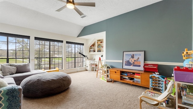 game room with a textured ceiling, lofted ceiling, visible vents, built in features, and carpet