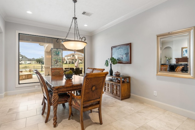 dining room featuring light tile patterned floors, baseboards, crown molding, and recessed lighting