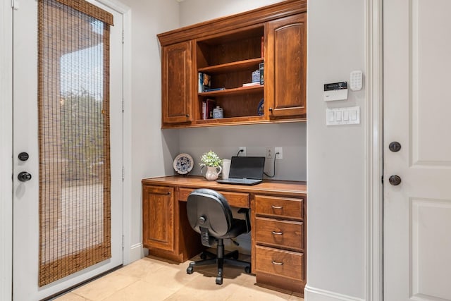 office area featuring built in study area