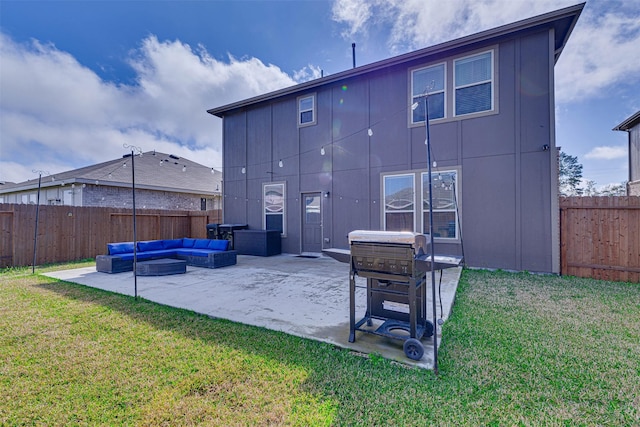 back of house featuring a fenced backyard, a lawn, an outdoor living space, and a patio