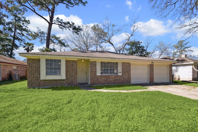 ranch-style home with brick siding, an attached garage, concrete driveway, and a front lawn