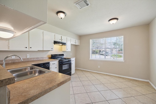 kitchen with black gas range oven, visible vents, under cabinet range hood, white cabinetry, and a sink