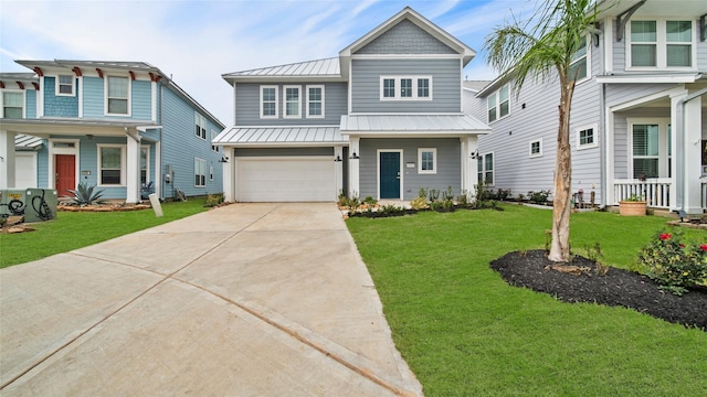 view of front of property featuring concrete driveway, metal roof, an attached garage, a standing seam roof, and a front lawn