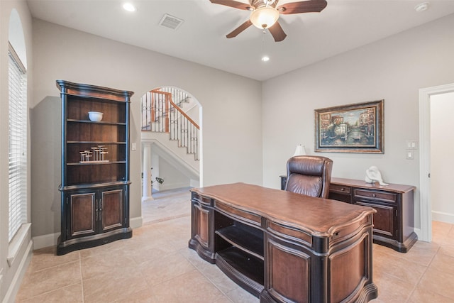 home office featuring baseboards, visible vents, arched walkways, a ceiling fan, and recessed lighting