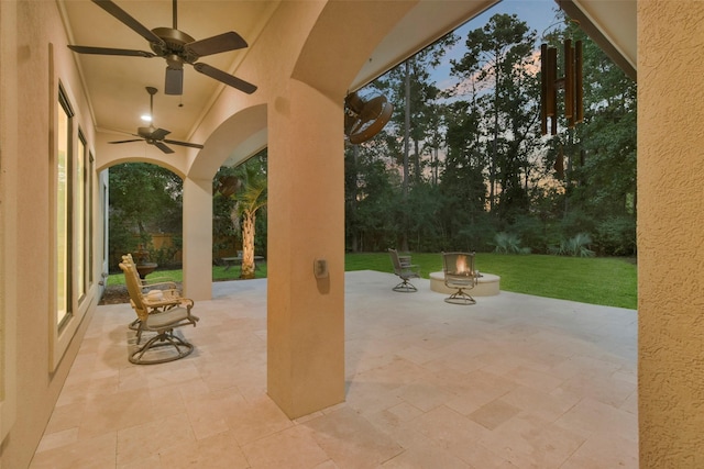 view of patio featuring a ceiling fan