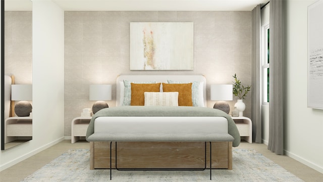 bedroom with baseboards, tile walls, and light colored carpet